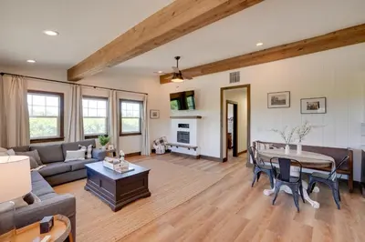 a living room with a couch and a table at Charming Lodi Retreat Walk to Local Wineries in Lodi