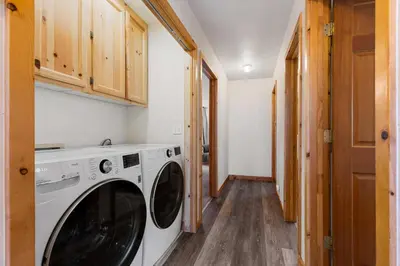a laundry room with a washer and dryer at Less Than 8 Mi to Donner Lake Home with Deck and Balcony! in Truckee