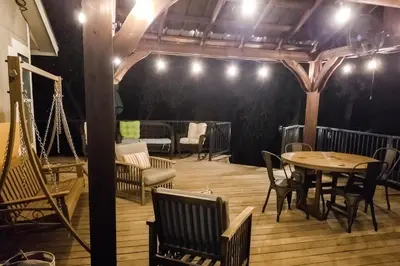 a dining room with a table and chairs at Out in the Wild in Oakhurst