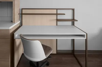 a white desk with a chair and a white desk at TownePlace Suites by Marriott Sacramento Rancho Cordova in Rancho Cordova