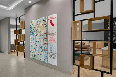 a room with a large poster on the wall at TownePlace Suites by Marriott Sacramento Rancho Cordova in Rancho Cordova