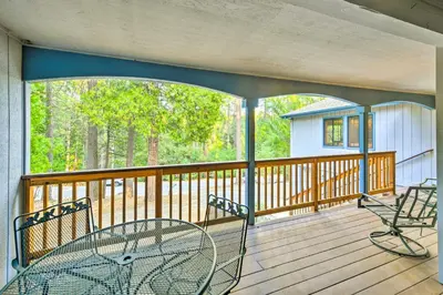 a porch with chairs and a table on a deck at Near Fishing and Hiking Pioneer Cabin with Decks in Pioneer