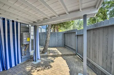 a house with a pay phone on a fence at Cute Central Placerville Studio Pet Friendly in Placerville