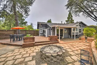 a home with a patio with a fire pit at Less Than 3 Mi to Dtwn Placerville Home with Outdoor Oasis in Placerville