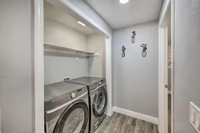 a laundry room with a washer and dryer in it at Less Than 3 Mi to Dtwn Placerville Home with Outdoor Oasis in Placerville