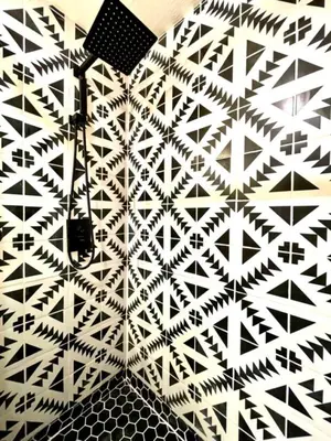 a black and white pattern on a wall with a brush at Top rated cabin w/spa Walk to the Village & Golf in Mammoth Lakes