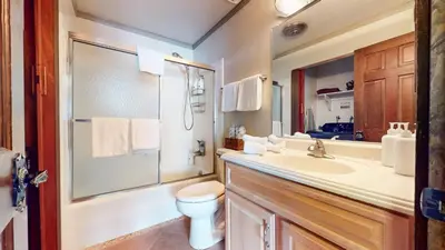 a bathroom with a sink and a toilet and a shower at Chateau Sans Nom #19 condo in Mammoth Lakes