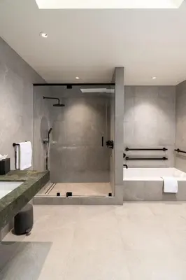 a bathroom with a shower and a bath tub at Desolation Hotel in South Lake Tahoe