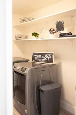 a kitchen with a microwave and a trash can at Gateway Retreat: Short Drive to the Sequoias in Exeter