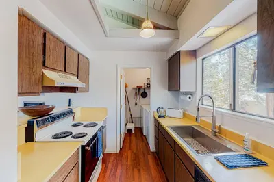 a kitchen with a sink and a stove at Falcon Nest in Incline Village