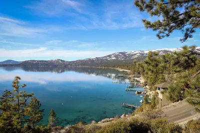 a view of a lake with mountains in the background at Falcon Nest in Incline Village