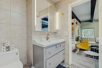 a bathroom with a sink and a toilet at Sierra Nevada Serenity in South Lake Tahoe