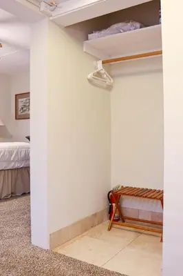 a room with a closet with a bed in it at The Bonnie Inn Unit 5 with Breakfast Nook in San Andreas