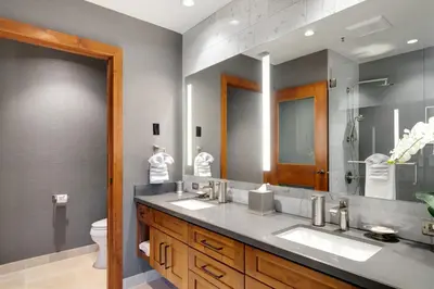 a bathroom with two sinks and a toilet at Ultimate Luxury Residence with Extras Galore across from Heavenly Village & Gondola - Zalanta Resort in South Lake Tahoe