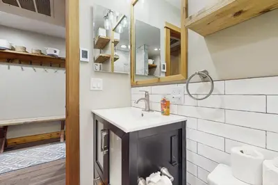 a bathroom with a sink and a mirror at Coyote Fork Escape in Truckee