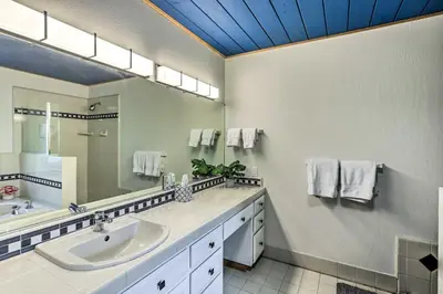 a bathroom with a sink and a mirror at 6 Mi to Homewood Mountain Resort Tahoe City Gem! in Tahoe City