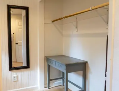 a dressing room with a table and a mirror at Hawks Nest- Perfect Getaway in Shaver Lake in Shaver Lake
