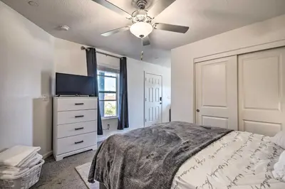 a bedroom with a bed and a ceiling fan at Contemporary Los Banos Studio Less Than 3 Mi to Dtwn! in Los Banos