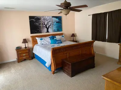 a bedroom with a bed and a ceiling fan at Waxberry Getaway Sequoia/Kings Canyon National Pks in Squaw Valley
