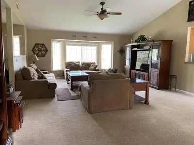 a living room with two couches and a table at Waxberry Getaway Sequoia/Kings Canyon National Pks in Squaw Valley