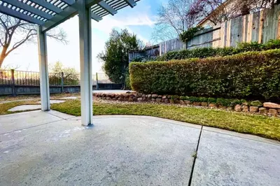 a patio with a pergola in a yard at King Bed Quiet Home on Cul-de-Sac Hiking Trails in Roseville