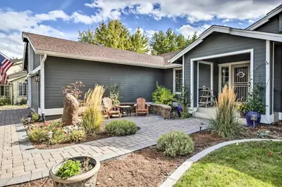 a home with a patio and a house at Hot Tub and Fire Pit Reno Gem 12 Mi to Skiing in Reno