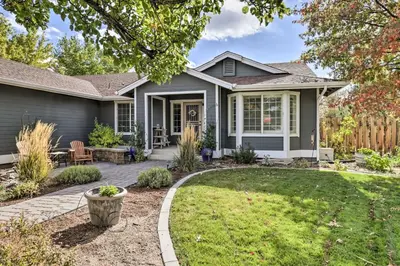 a house with a patio and a yard at Hot Tub and Fire Pit Reno Gem 12 Mi to Skiing in Reno