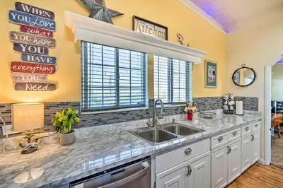 a kitchen with a sink and a window at Bethel Island Retreat with Private Boat Slip! in Bethel Island