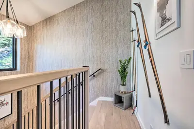 a staircase in a house with a potted plant at Hot Tub! Family Home 7 Mi to Diamond Peak Resort in Kings Beach