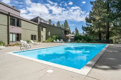 a swimming pool in the backyard of a house at Summit #256 - Top Floor Summit 1 Bedrm 1 Bathrm Condo Just steps too Little Eagle Lodge Sleeps 4 in Mammoth Lakes