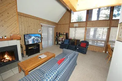a living room with a couch and a fireplace at 1116 Golden Bear home in South Lake Tahoe