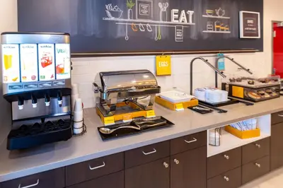 a kitchen with a counter with a food appliance at Hampton Inn Selma, Ca in Selma