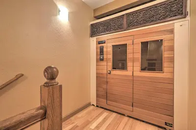 a large wooden garage door in a house at 3 Mi to Skiing! Incline Village Retreat with Sauna in Incline Village