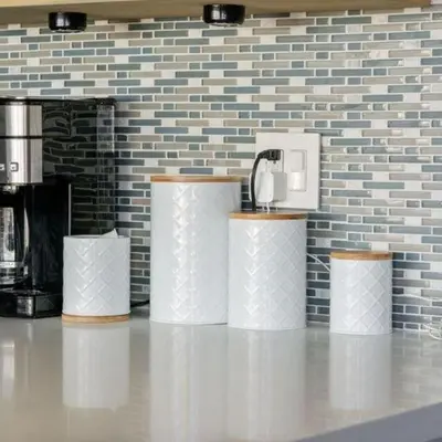 a row of three paper towels in a room with a brick wall at Panorama Place in Reno