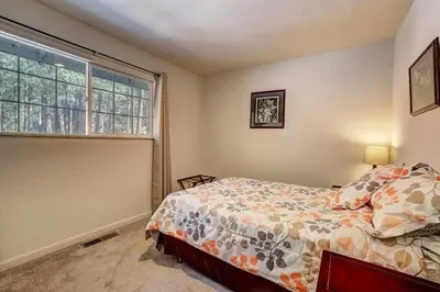 a bedroom with a bed and a window at 1763 Saponi Street home in South Lake Tahoe