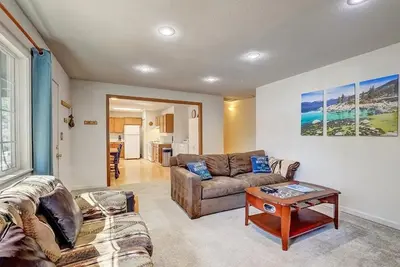 a living room with a couch and a table at 1763 Saponi Street home in South Lake Tahoe