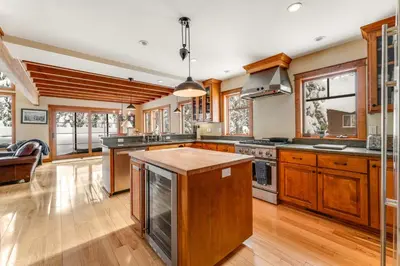 a kitchen with wooden cabinets and a counter top at Cabin in Soda Springs in Soda Springs