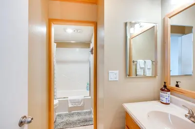a bathroom with a sink and a mirror at 2 Mi to Heavenly Mtn Resort Retreat with Sauna! in Stateline