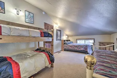a room with two bunk beds in a house at Shuttle to Ski Resort Northstar Home! in Truckee