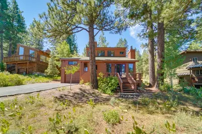 a home in the woods with trees at Shuttle to Ski Resort Northstar Home! in Truckee