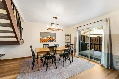 a dining room with a table and chairs at Lake Forest Drive Retreat in Tahoe City