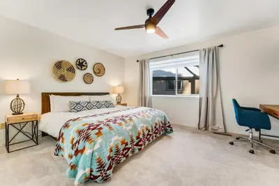 a bedroom with a bed and a window at Lake Forest Drive Retreat in Tahoe City