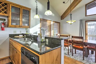a kitchen with a sink and a counter top at Steps to Diamond Peak Incline Village Condo in Incline Village