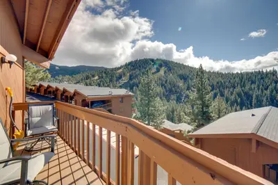 a balcony with a view of a mountain at Steps to Diamond Peak Incline Village Condo in Incline Village