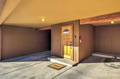 a front door of a house with a garage at Steps to Diamond Peak Incline Village Condo in Incline Village