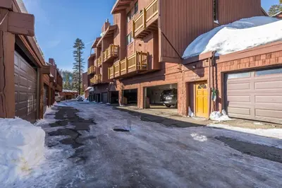 an empty street in front of some buildings at Mammoth Ski and Racquet 71 in Mammoth Lakes