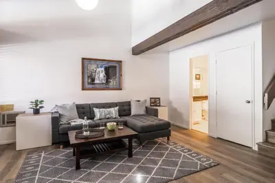 a living room with a couch and a table at Mammoth Ski and Racquet 71 in Mammoth Lakes