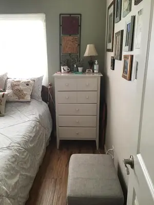 a bedroom with a bed and a dresser and a window at Clovis, CA National Parks Room in Clovis