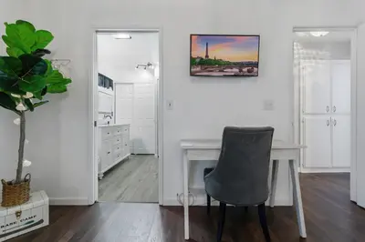 a white room with a desk and a chair at Fully-Stocked, Pet-friendly, Relaxing Home Near Yosemite and Bass Lake in North Fork