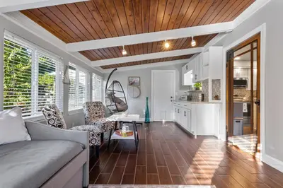 a kitchen and living room with a couch and a table at Fully-Stocked, Pet-friendly, Relaxing Home Near Yosemite and Bass Lake in North Fork
